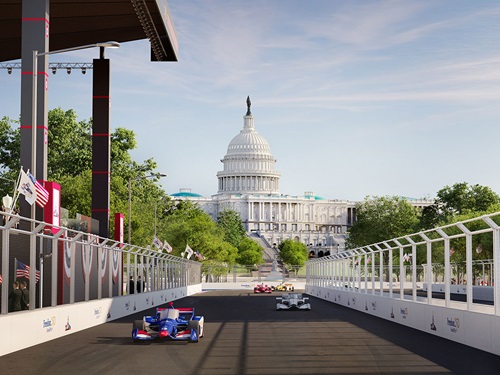Cars race in front of the capital building